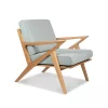 The Helsinki Armchair is influenced by the 1950’s Scandinavian furniture makers. Hand crafted by Buywood Furniture with solid wood, this chair is extremely comfortable to sit in with its web suspended seat system.