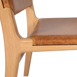 Designed and crafted by Buywood Furniture from a range of Australian hardwood timbers, and extensive leather ranges, the Waratah Dining Chair can pair with any dining suite with ease.