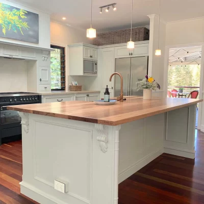 Kitchen bench top crafted from solid Blackbutt Timber with power point and sink custom designed by Buywood Furniture, Brisbane.