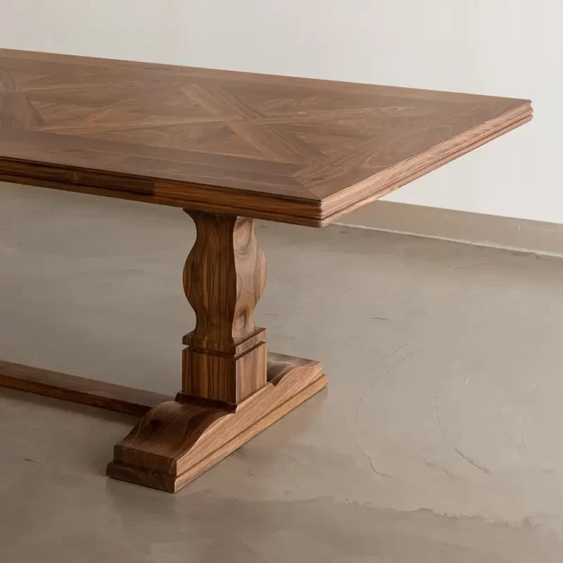 The Burbank dining table with its unique French Parquetry detailing is custom made by Buywood Furniture, Brisbane using time honored joinery skills.