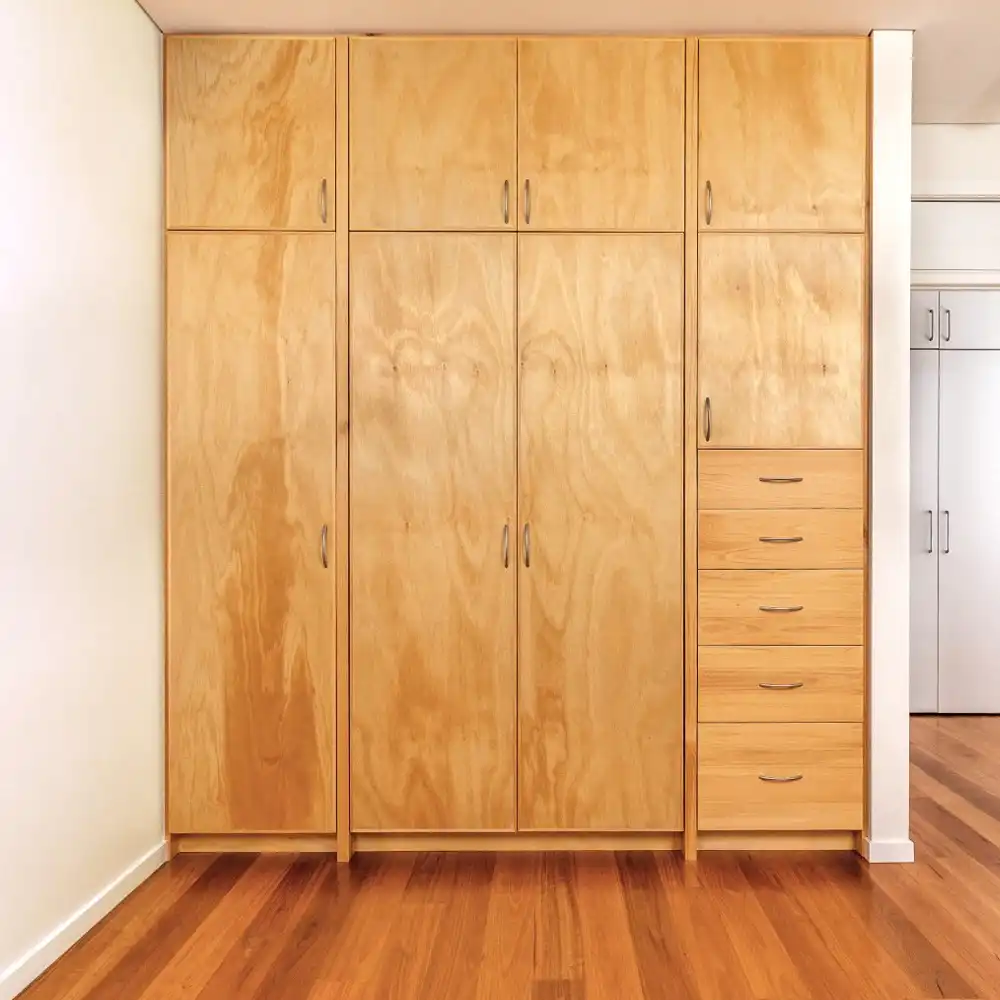 Custom built-in-wardrobe perfect for 2 & 3rd bedrooms. Fitted with classic joinery details such as dovetailed drawers. Designed and built by Buywood Furniture, Brisbane.