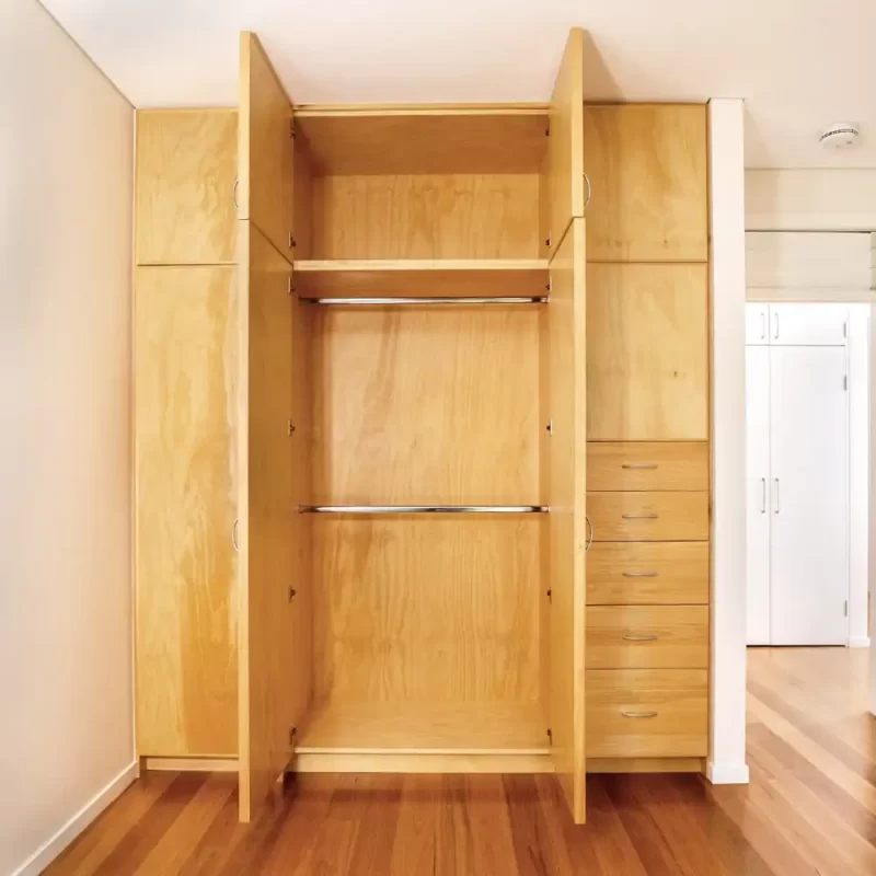 Custom built-in-wardrobe perfect for 2 & 3rd bedrooms. Fitted with classic joinery details such as dovetailed drawers. Designed and built by Buywood Furniture, Brisbane.