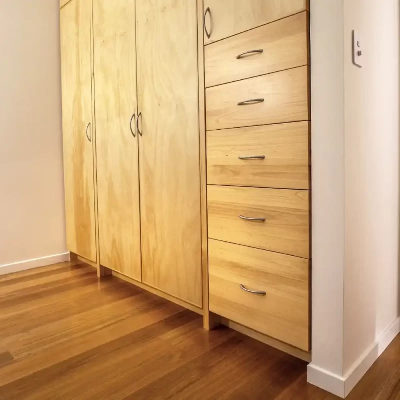 Custom built-in-wardrobe perfect for 2 & 3rd bedrooms. Fitted with classic joinery details such as dovetailed drawers. Designed and built by Buywood Furniture, Brisbane.