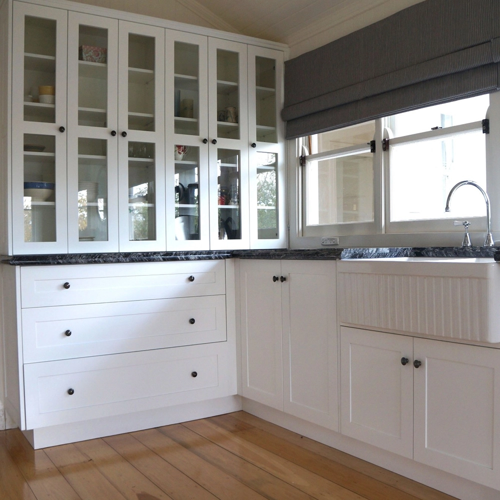 Hamptons Style kitchen installation, in solid timber, American Oak and stunning granite bench tops was custom designed and made by Buywood Furniture, Brisbane.