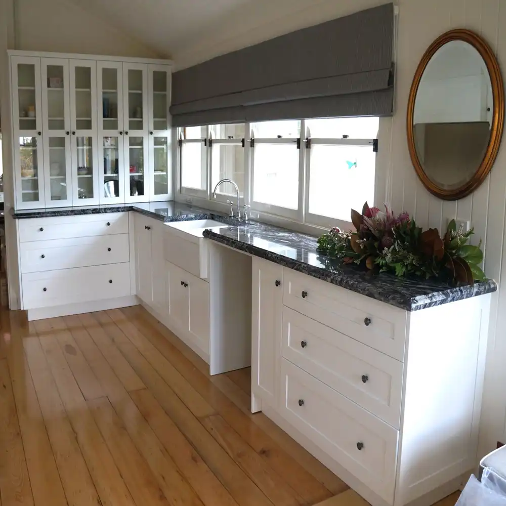 Hamptons Style kitchen installation, in solid timber, American Oak and stunning granite bench tops was custom designed and made by Buywood Furniture, Brisbane.