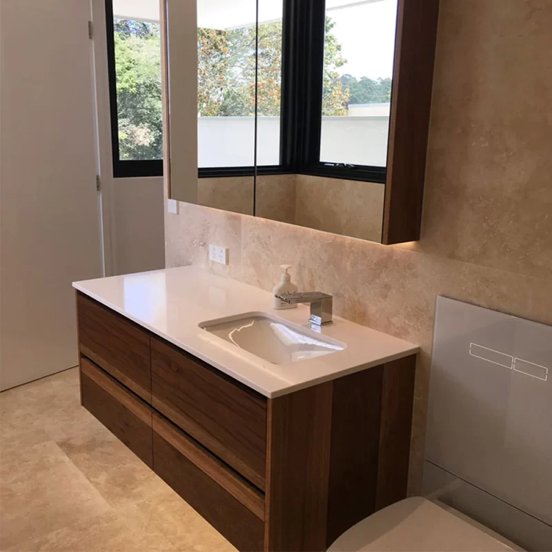 Custom designed, crafted and installed bathroom vanity using your choice of wood by Buywood Furniture.