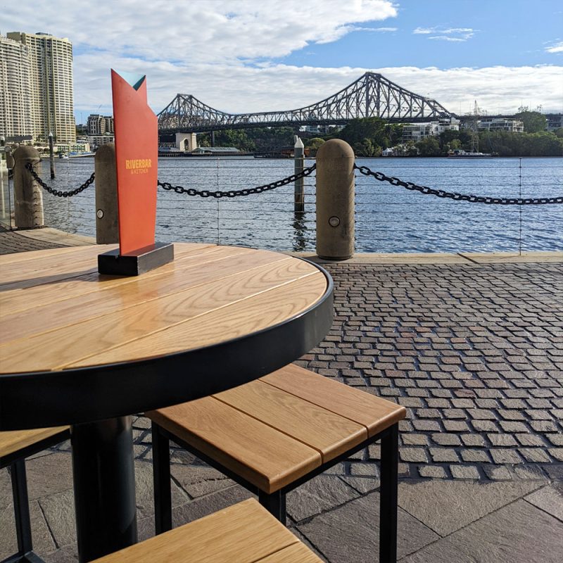 Buywood Furniture were so grateful to be a part of crafting a range of custom timber benchtops, chairs, stools, and booth seating. for River Bar & Kitchen, Brisbane.