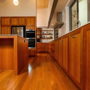 Using the beautiful Silky Oak timber and only the finest materials, Buywood Furniture made to measure, designed and built this stunning spacious kitchen and island bench.