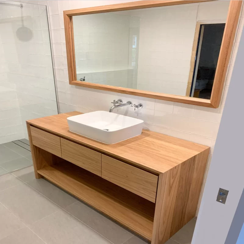 Zephran Bathroom Vanity with both drawers and built in shelf options custom mirror by Buywood Furniture.