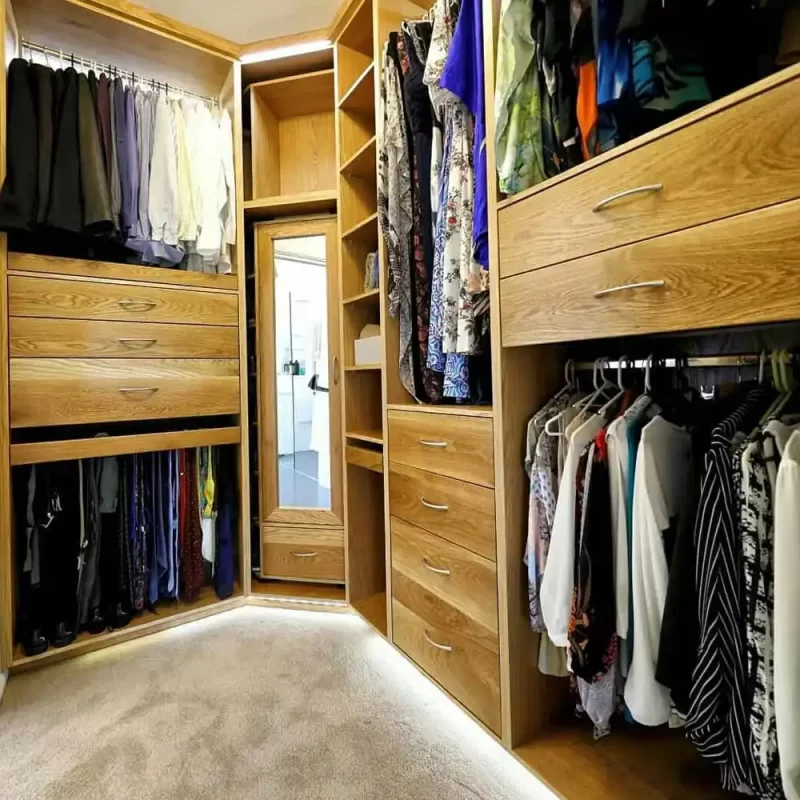 Custom walk in wardrobe fitted with classic dovetail drawers and top quality gadgets and mechanisms can be custom designed to suit your storage needs and fit into any home.