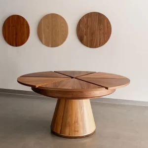 The Alpha Extension Table crafted by Buywood Furniture The Alpha Expansion Table a round expansion table that is capable of doubling its seating capacity whilst remaining circular.