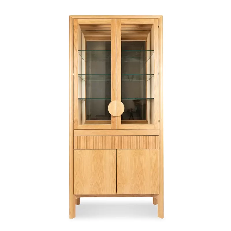 The Jensen Drinks Cabinet has been designed to complement the Jensen range. Featuring glass doors, stunning half-moon handles and 3D channeling detail on the draw fronts and dovetail joint drawers.