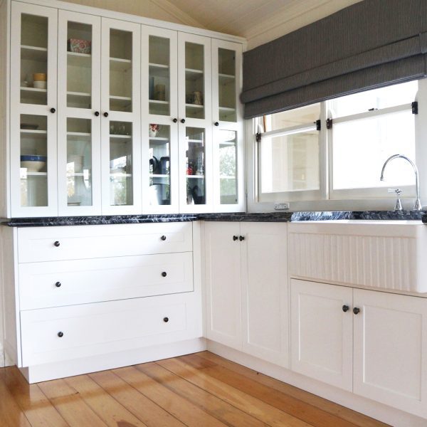 Hamptons Style kitchen renovation, in solid timber, farmhouse sink was made from American Oak and granite bench tops by Buywood Furniture, Fortitude Valley.