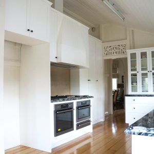 Hamptons Style kitchen renovation, in solid timber was made from American Oak and granite bench tops by Buywood Furniture, Brisbane