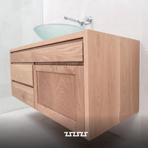 Bathroom Vanity crafted in American Oak and sleek finger pull drawers and cupboards by Buywood Furniture
