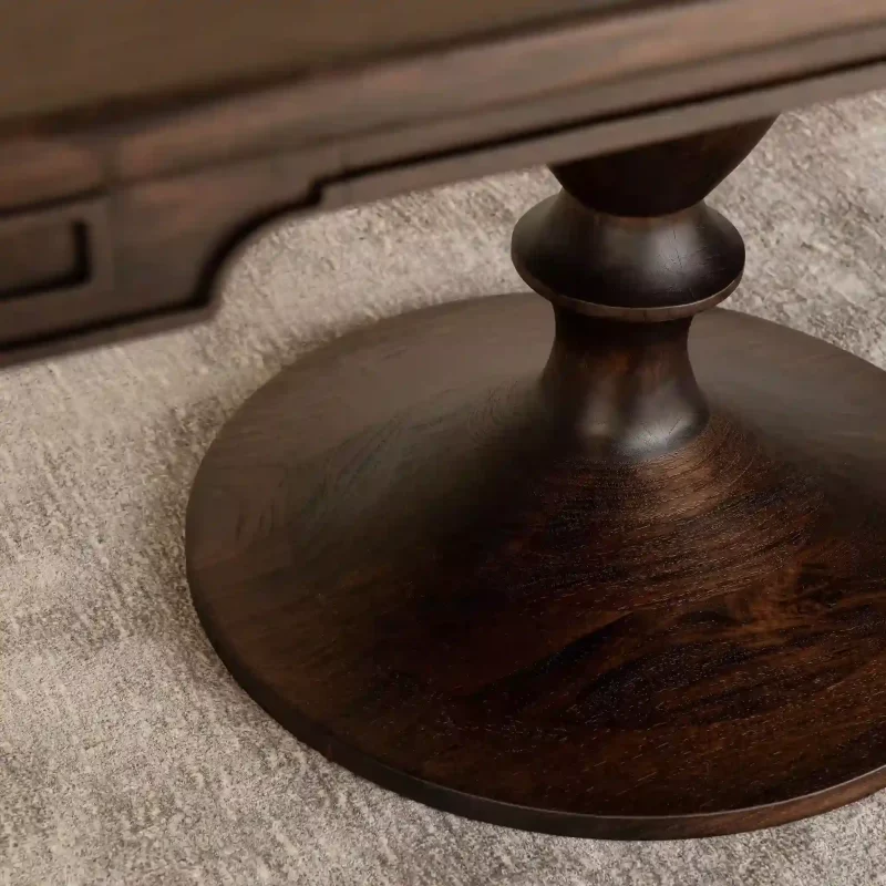 This exquisite parquetry dining table, with its Ancient Chocolate stain over Rosewood, boasts a beautiful new apron detail and classic-designed legs.