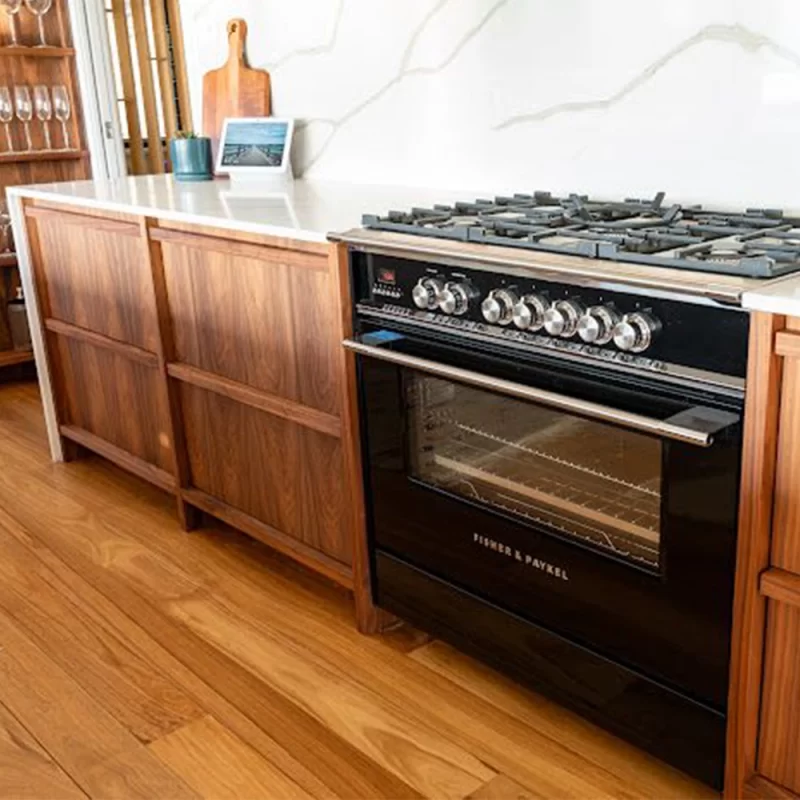 Black walnut kitchen cabinetry designed and crafted with precision by the Buywood Furniture Kitchen and joinery team,