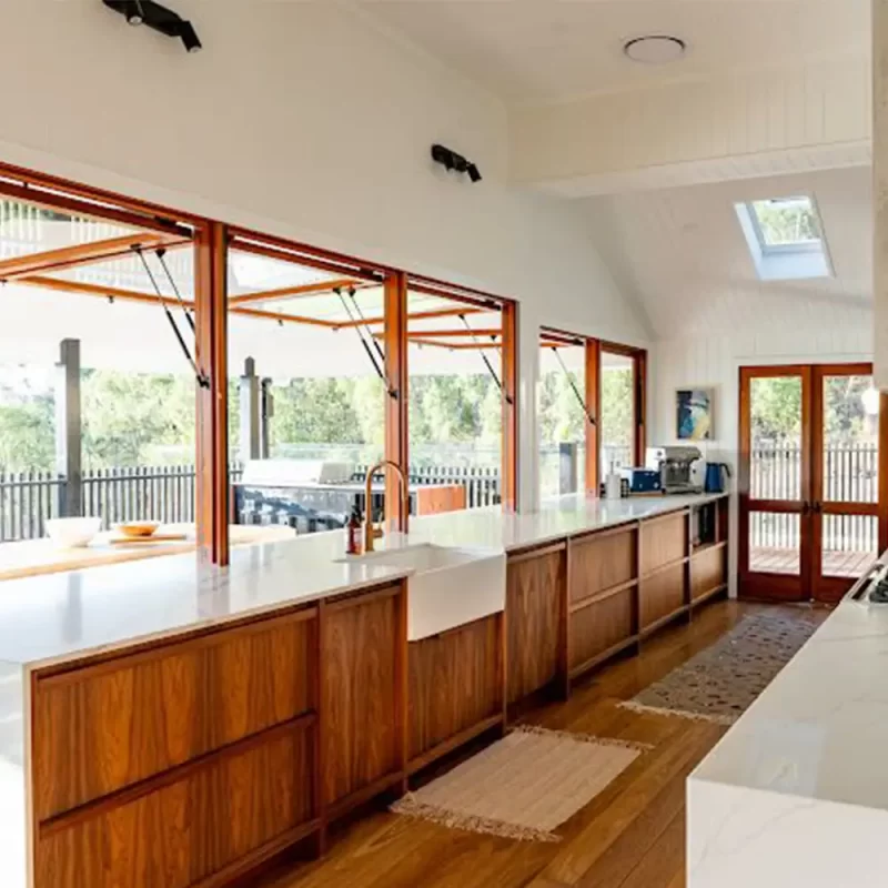 Black walnut kitchen cabinetry designed and handcrafted with precision by the Buywood Furniture Kitchen and joinery team,